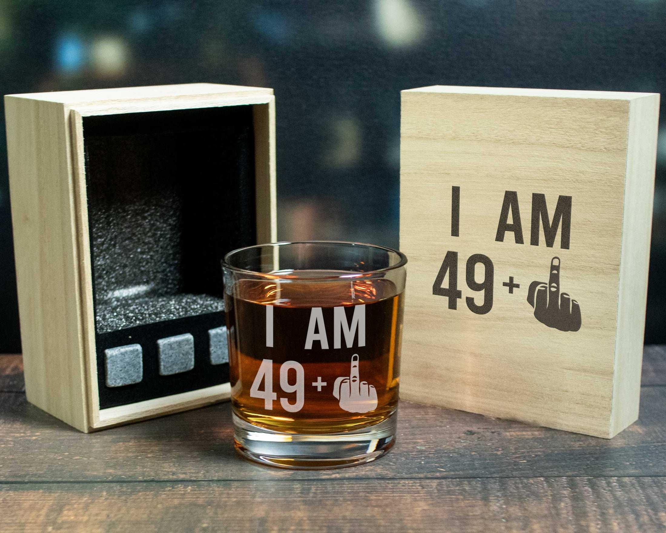 I am 49 + 1 middle finger engraved on a whiskey glass with a wood gift box